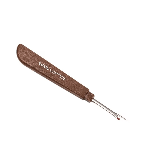 Cet accessoire permet de couper les fils des boutons facilement et en toute sécurité.